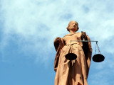 Statut représentant la Justice