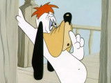 Droopy en train de s'appuyer sur un mur