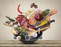 Multitude d'aliments avec des ustensiles de cuisine