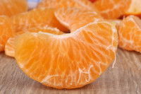 Des quartiers de clémentine en gros plan