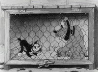 Pluto, en cage, dans "Rien qu'un chien" ©Disney