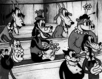 Dingo (au centre) dans « Mickey au théâtre » (©Disney)