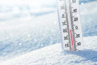 Un thermomètre dans la neige indique 0°C